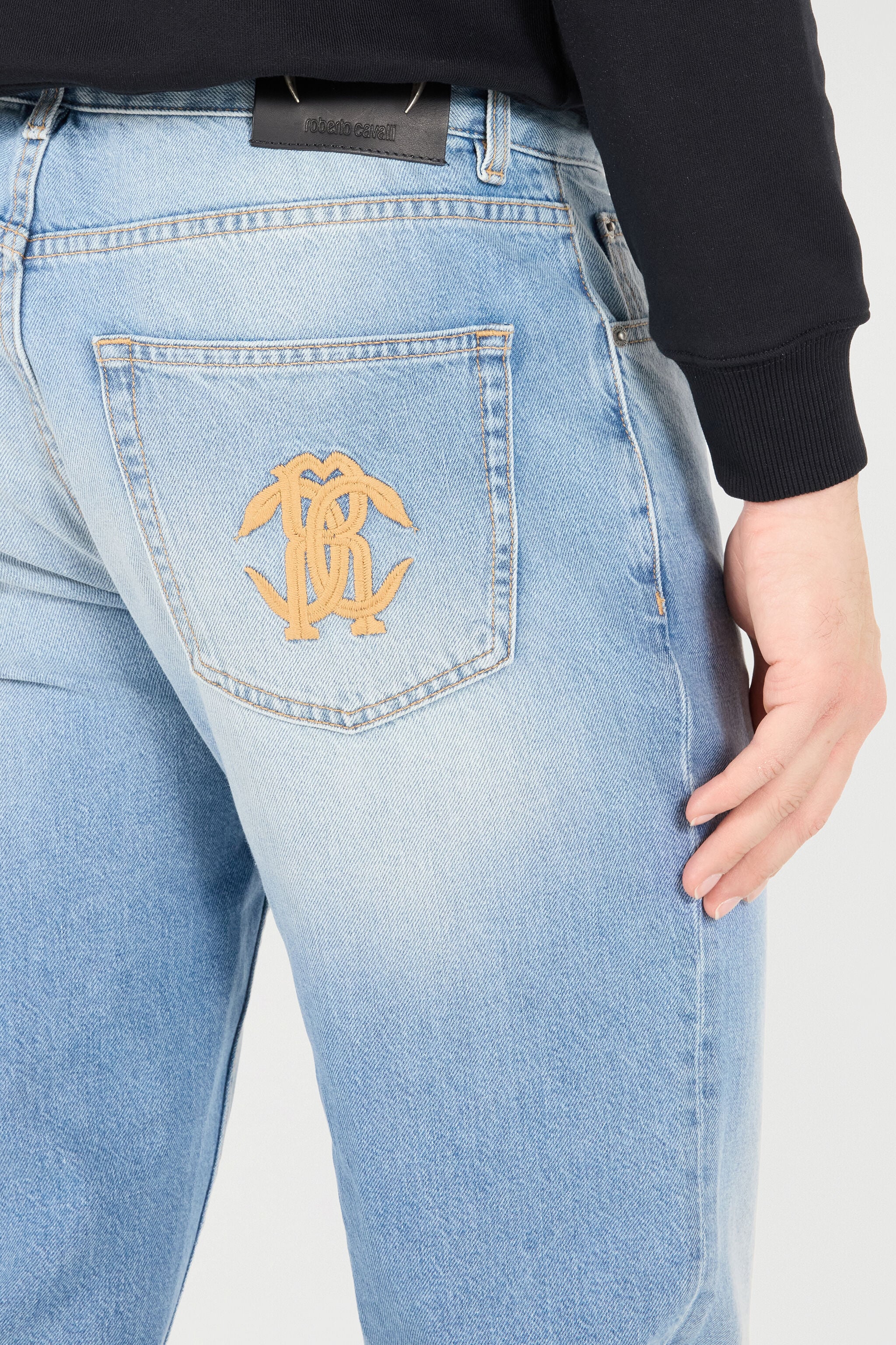 Jeans With Faded Detailing in Light blue for Men | Roberto Cavalli®