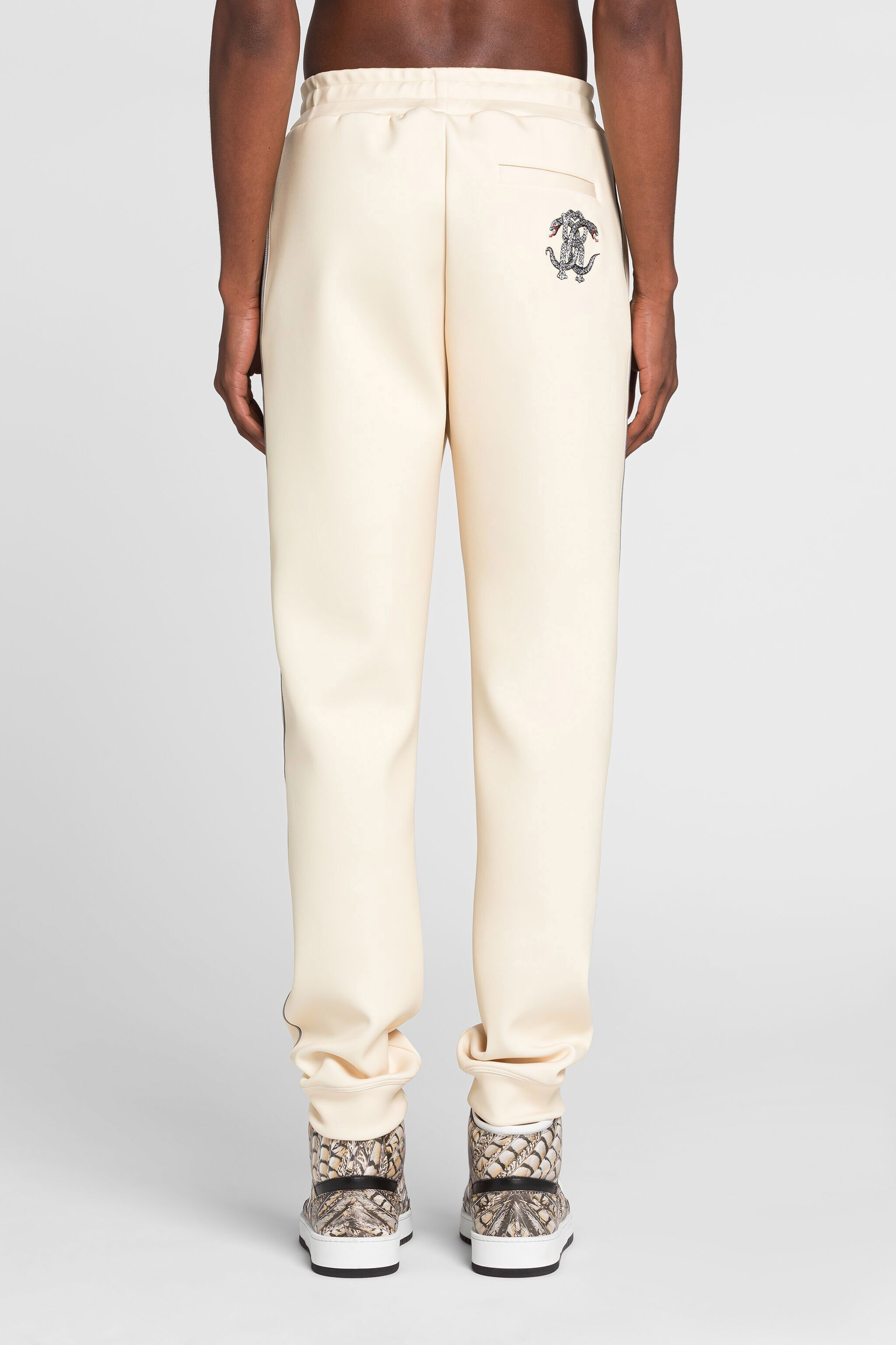 RC Mirror Snake logo-embroidered track pants RC Mirror Snake logo-embroidered track pants Ivory QRT25E-FT001