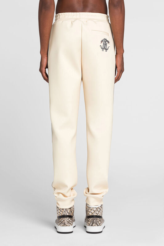 RC Mirror Snake logo-embroidered track pants RC Mirror Snake logo-embroidered track pants Ivory QRT25E-FT001