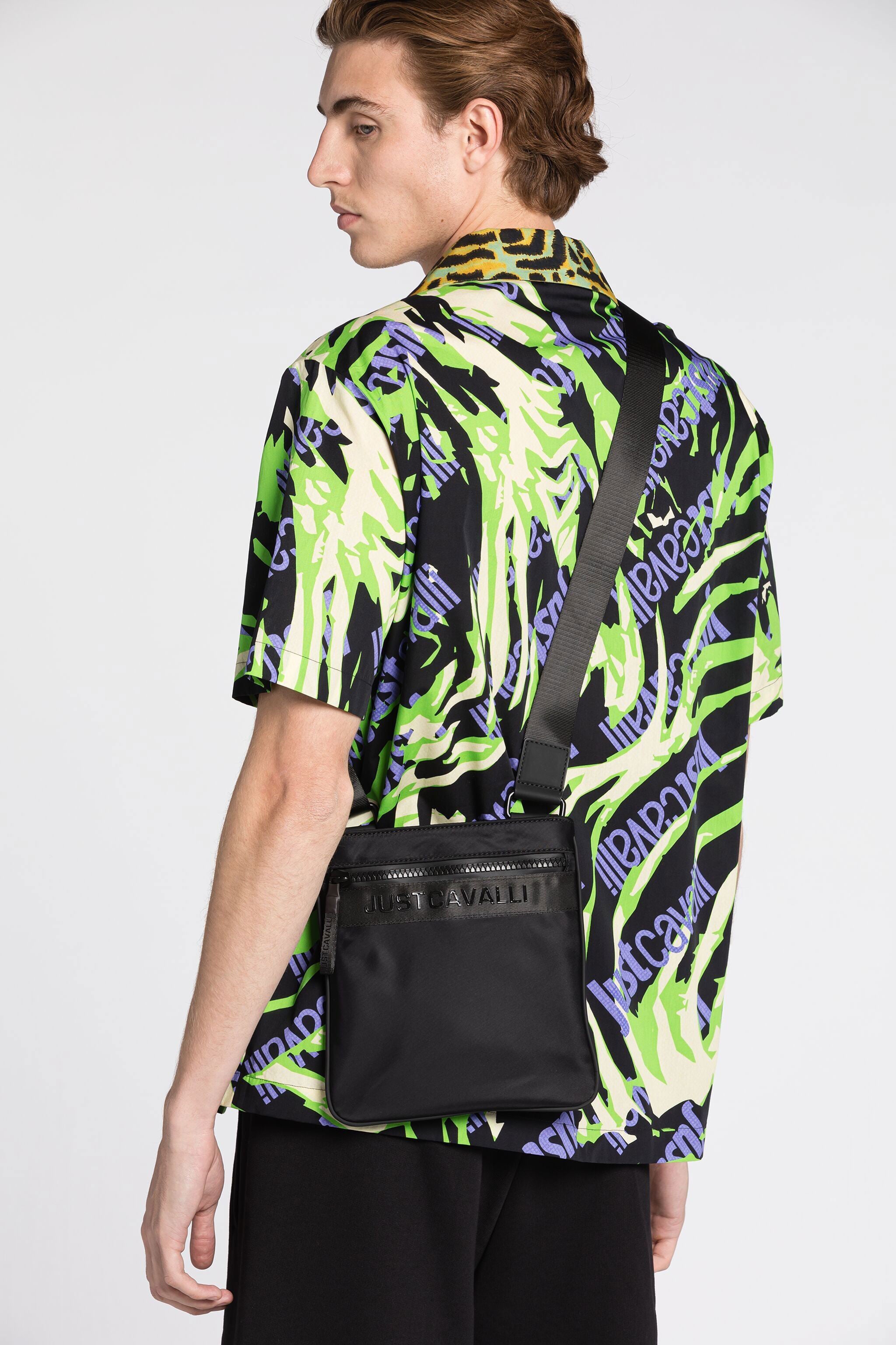 JC Just Cavalli Logo-Appliqué Crossbody Bag JC Just Cavalli Logo-Appliqué Crossbody Bag BLACK Q62339-Q1242