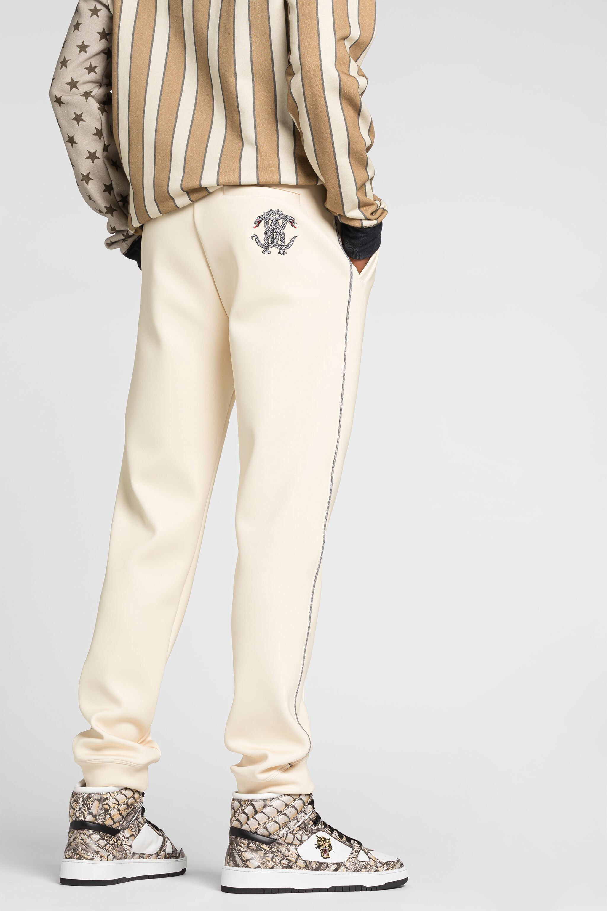 RC Mirror Snake logo-embroidered track pants RC Mirror Snake logo-embroidered track pants Ivory QRT25E-FT001