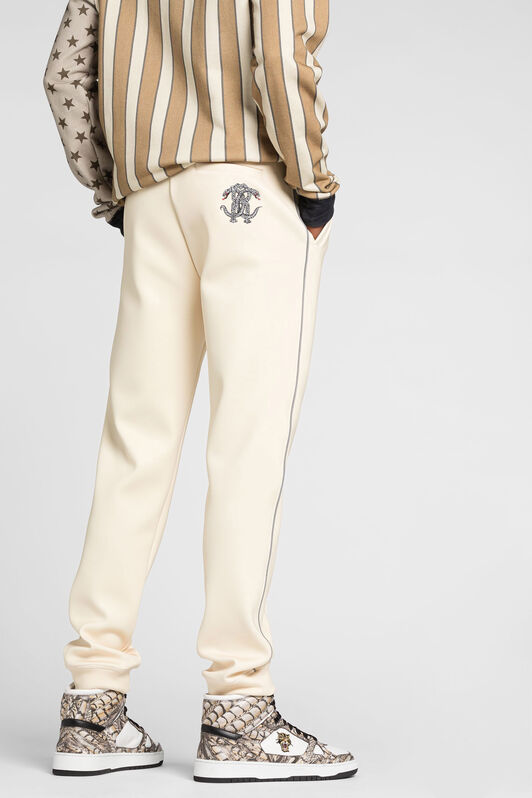 RC Mirror Snake logo-embroidered track pants RC Mirror Snake logo-embroidered track pants Ivory QRT25E-FT001