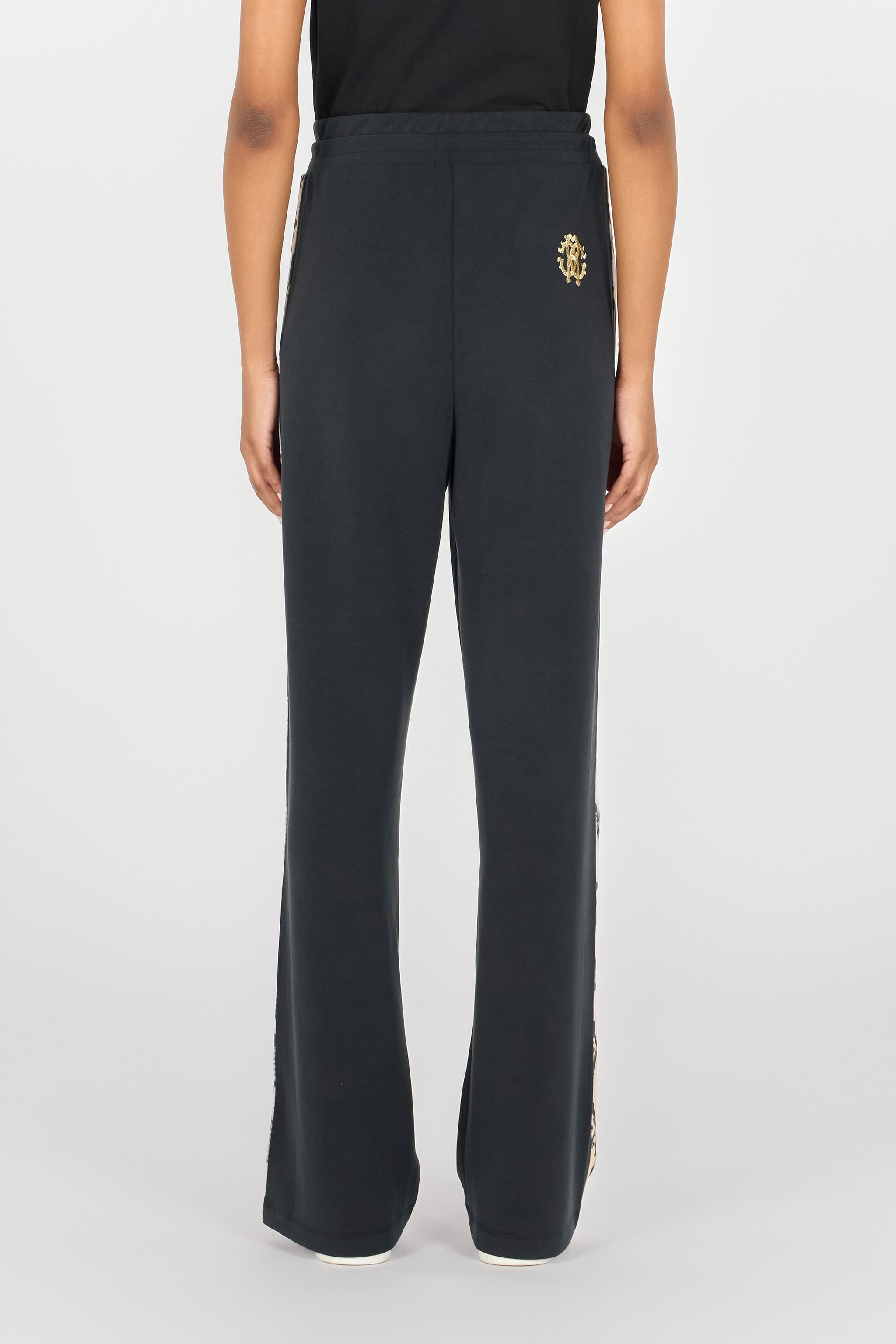 Trousers with snake bands in Black for Women | Roberto Cavalli®