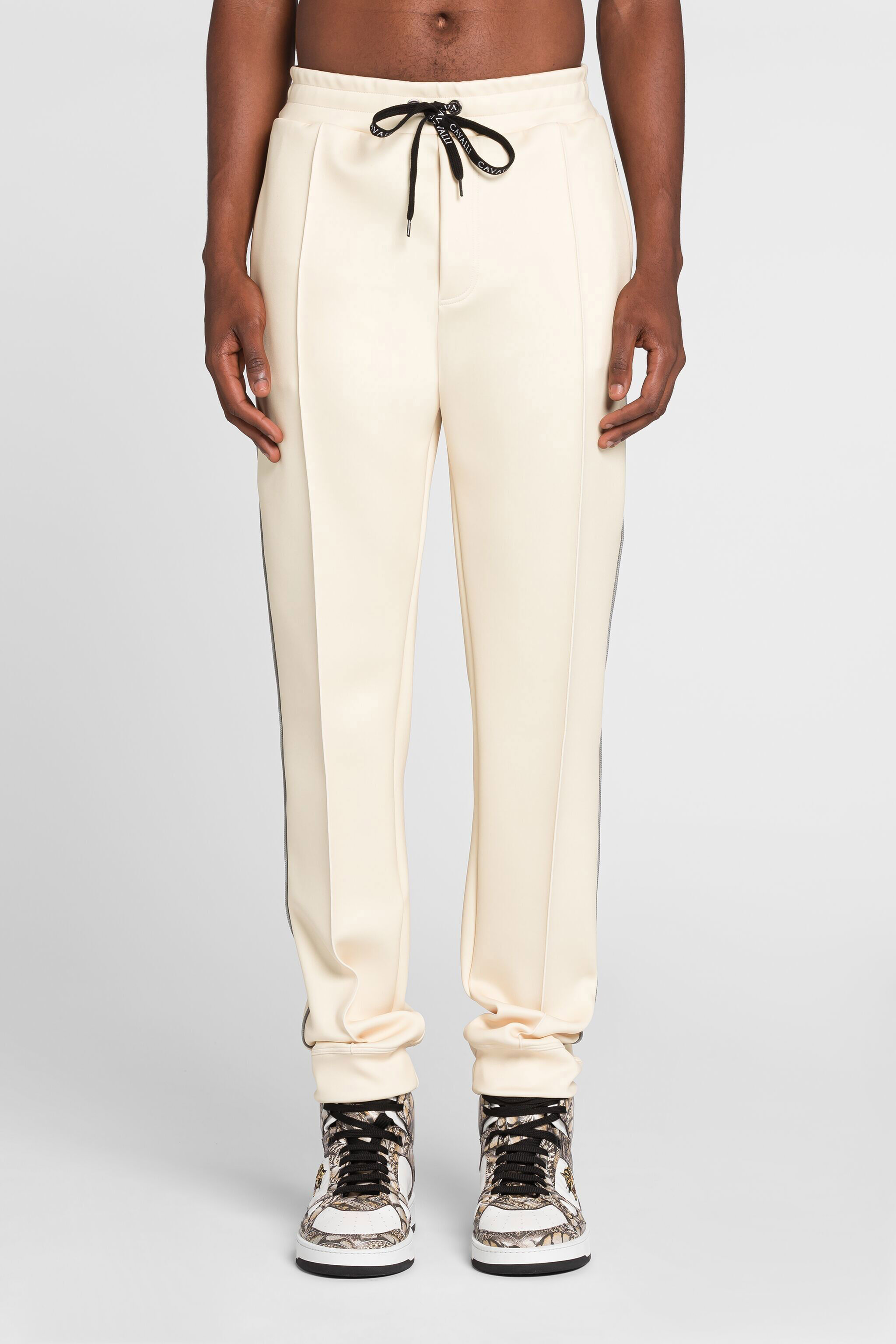 RC Mirror Snake logo-embroidered track pants RC Mirror Snake logo-embroidered track pants Ivory QRT25E-FT001