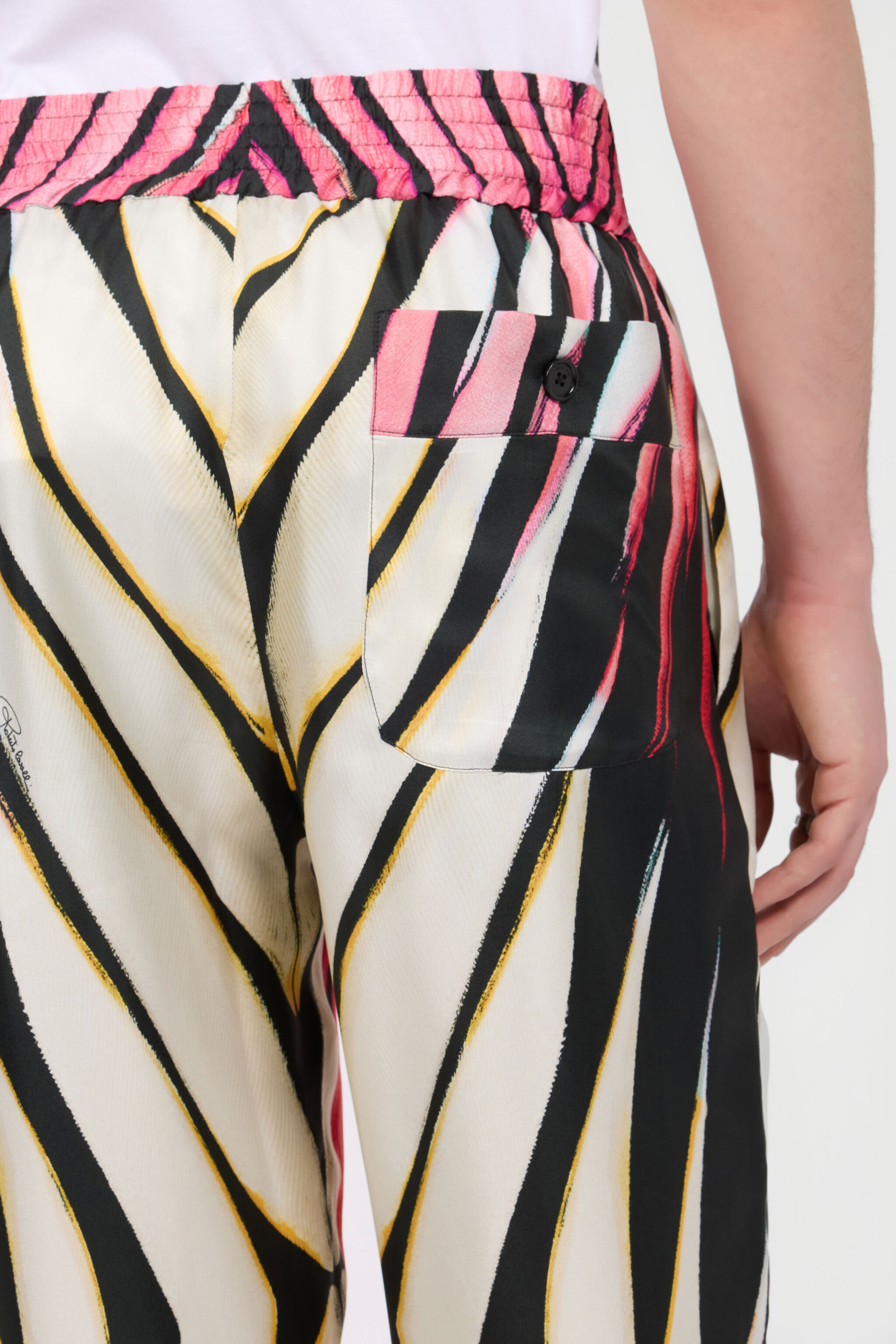 Ray Of Paradise Print Trousers in CORAL PINK for Men | Roberto