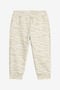 JU Pantalon À Imprimé Tiger Skin Et Monogramme RC Ivoire UJT221-5OO44