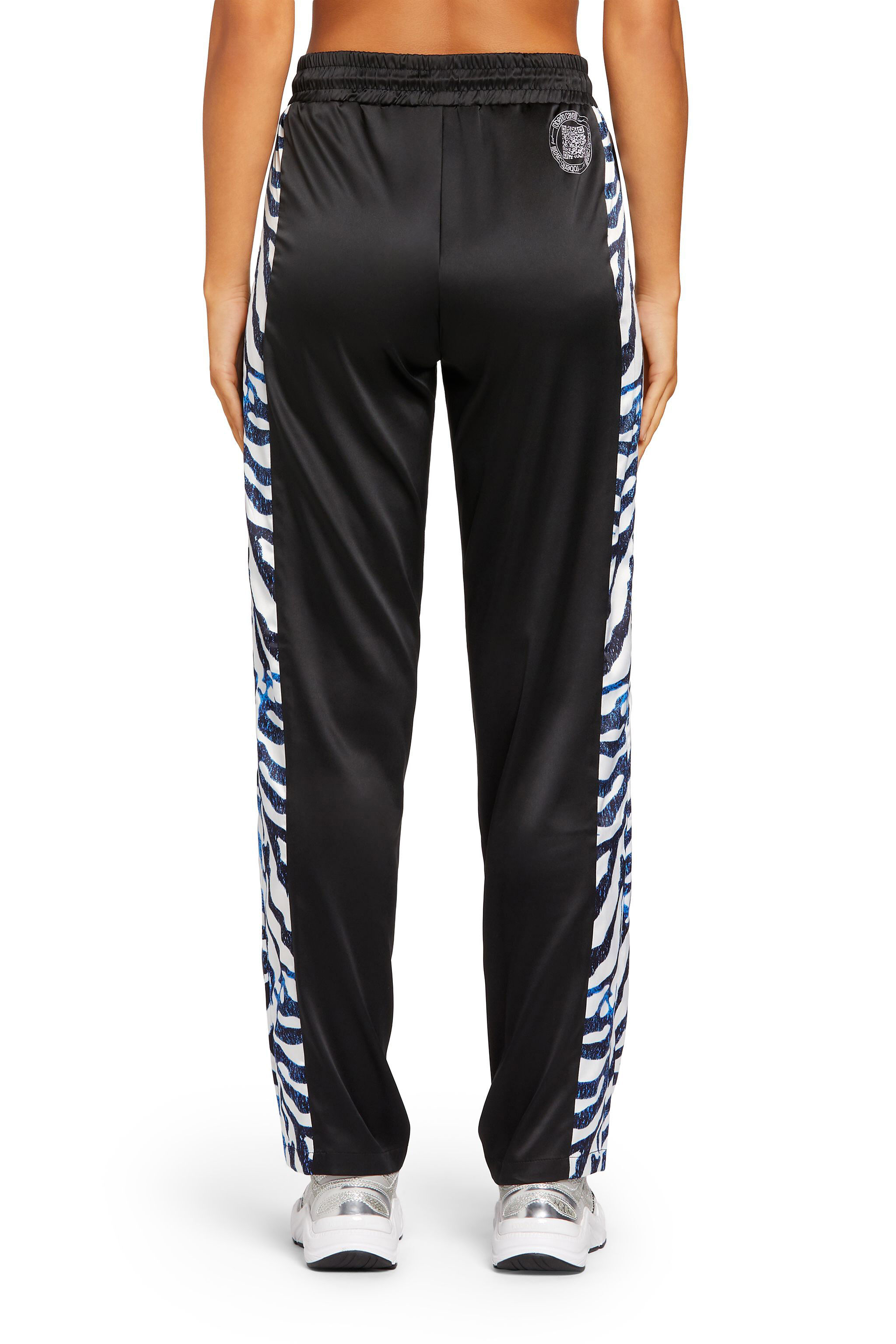 UG Sea Zebra-print track pants UG Sea Zebra-print track pants BLACK/WHITE/BLUE MYY12P-ROA57
