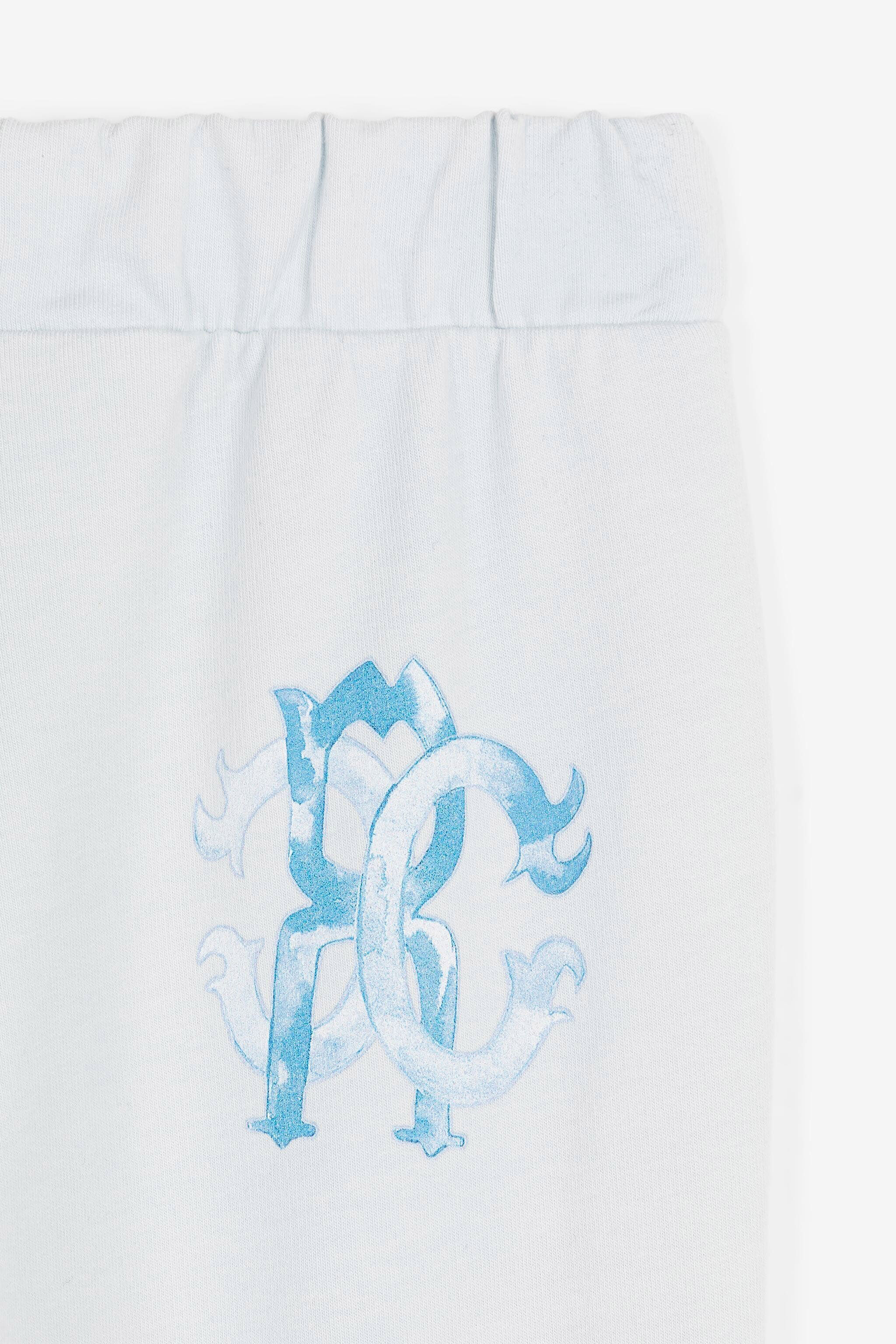 JU Logo-print cotton track pants Light blue QJT248-CF050