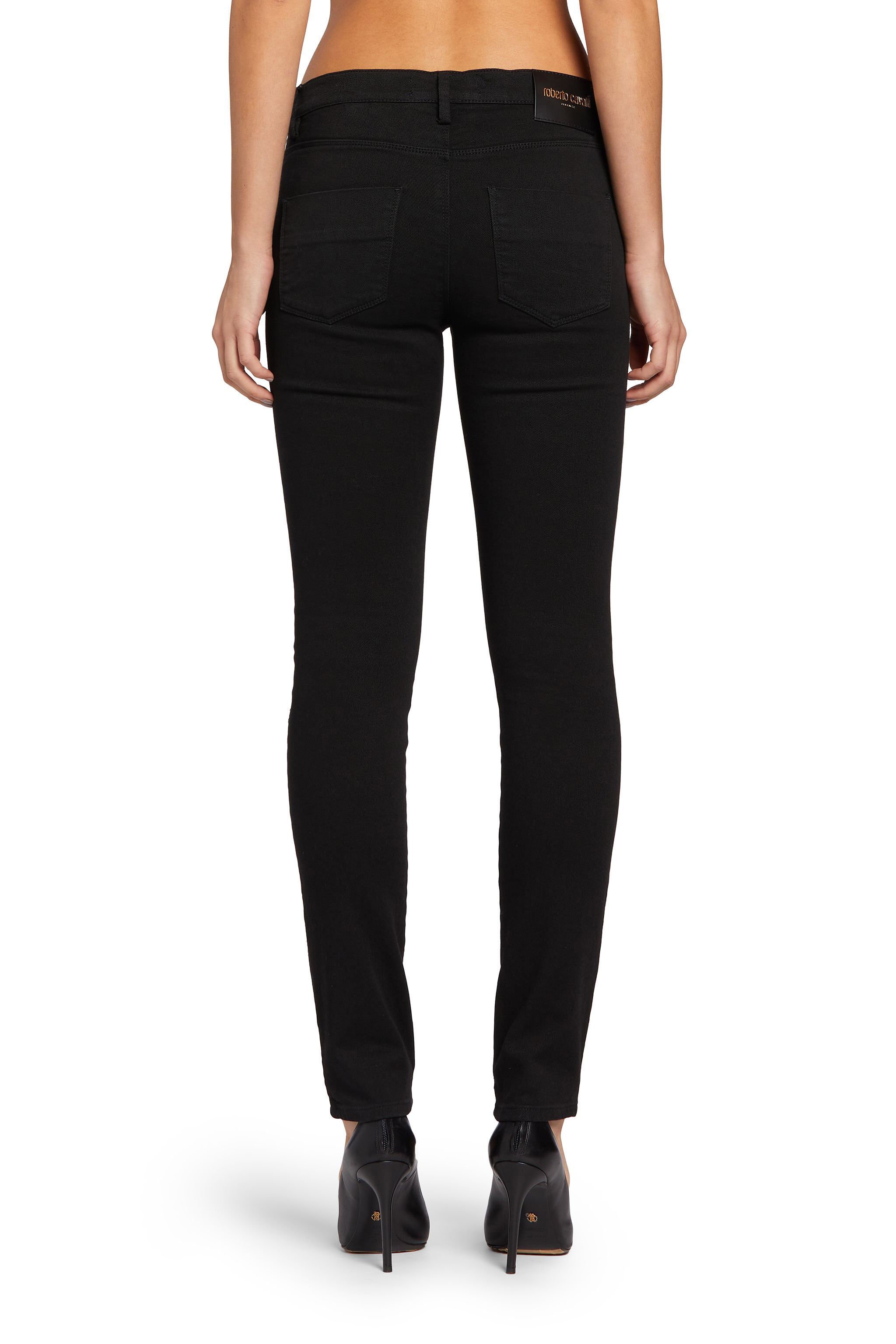 RC Skinny Jeans mit Einsatz in Python-Optik Schwarz MQJ212-DN003