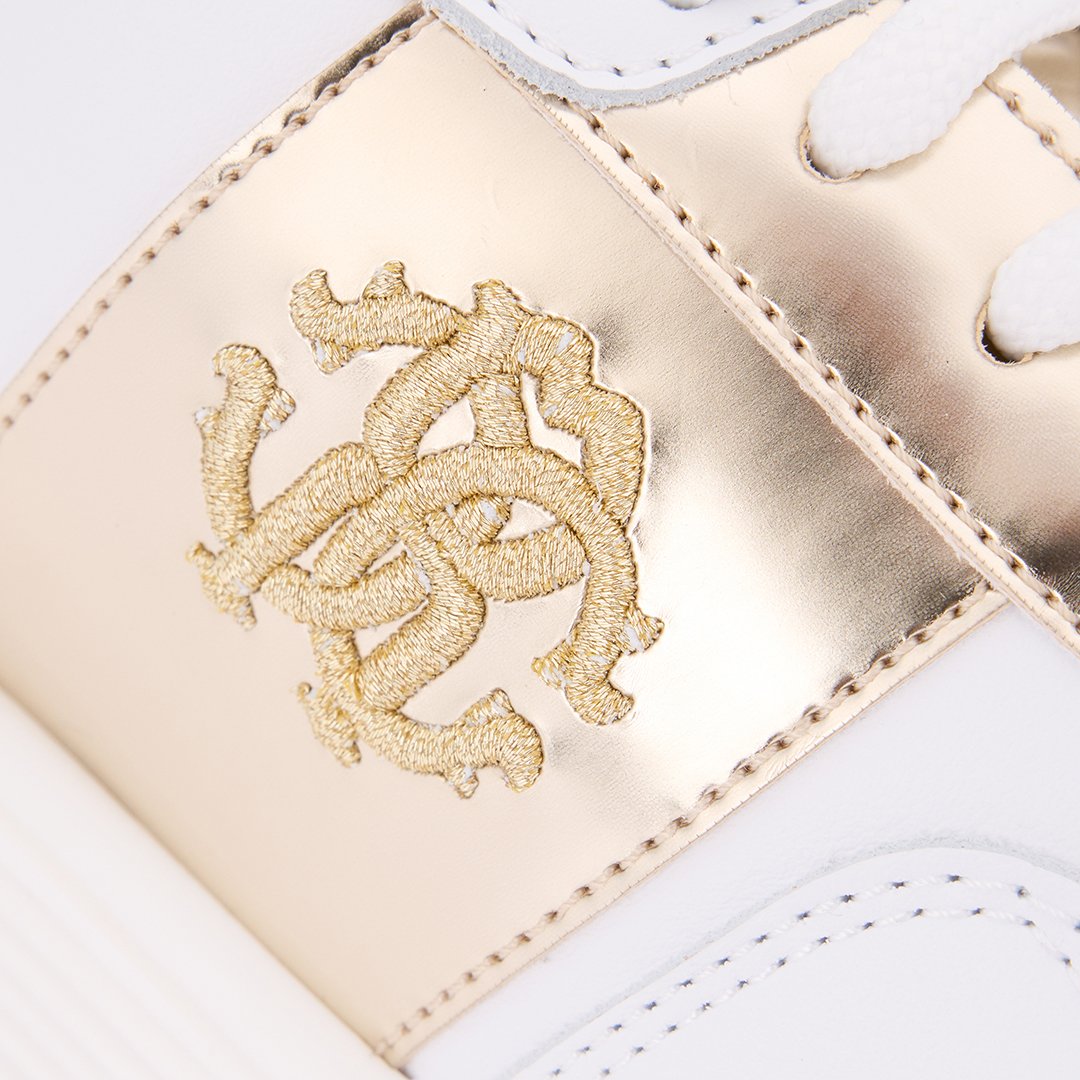 White Running Shoes With Gold Monogram RC