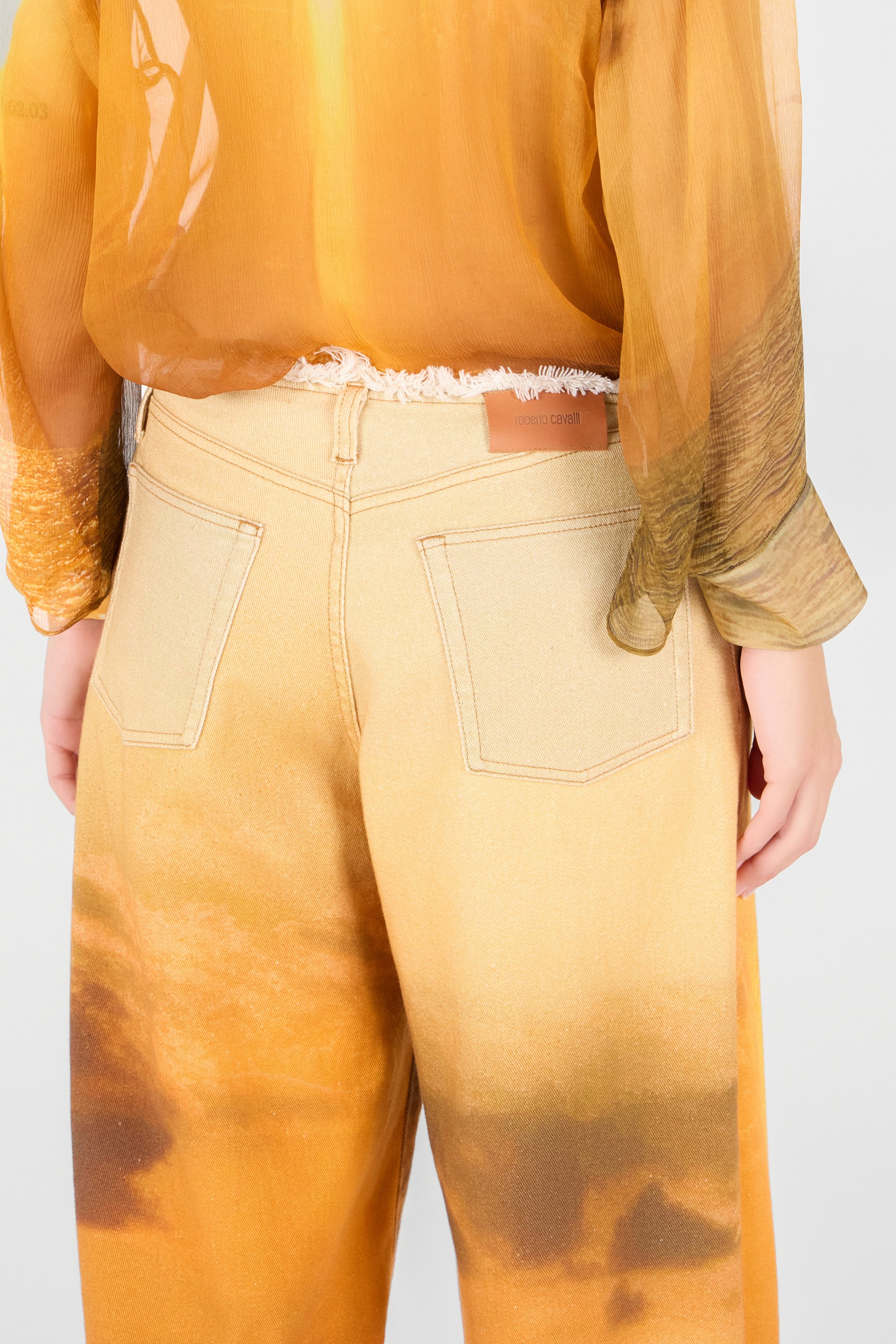 Roberto Cavalli Graphic-print Trousers In Orange
