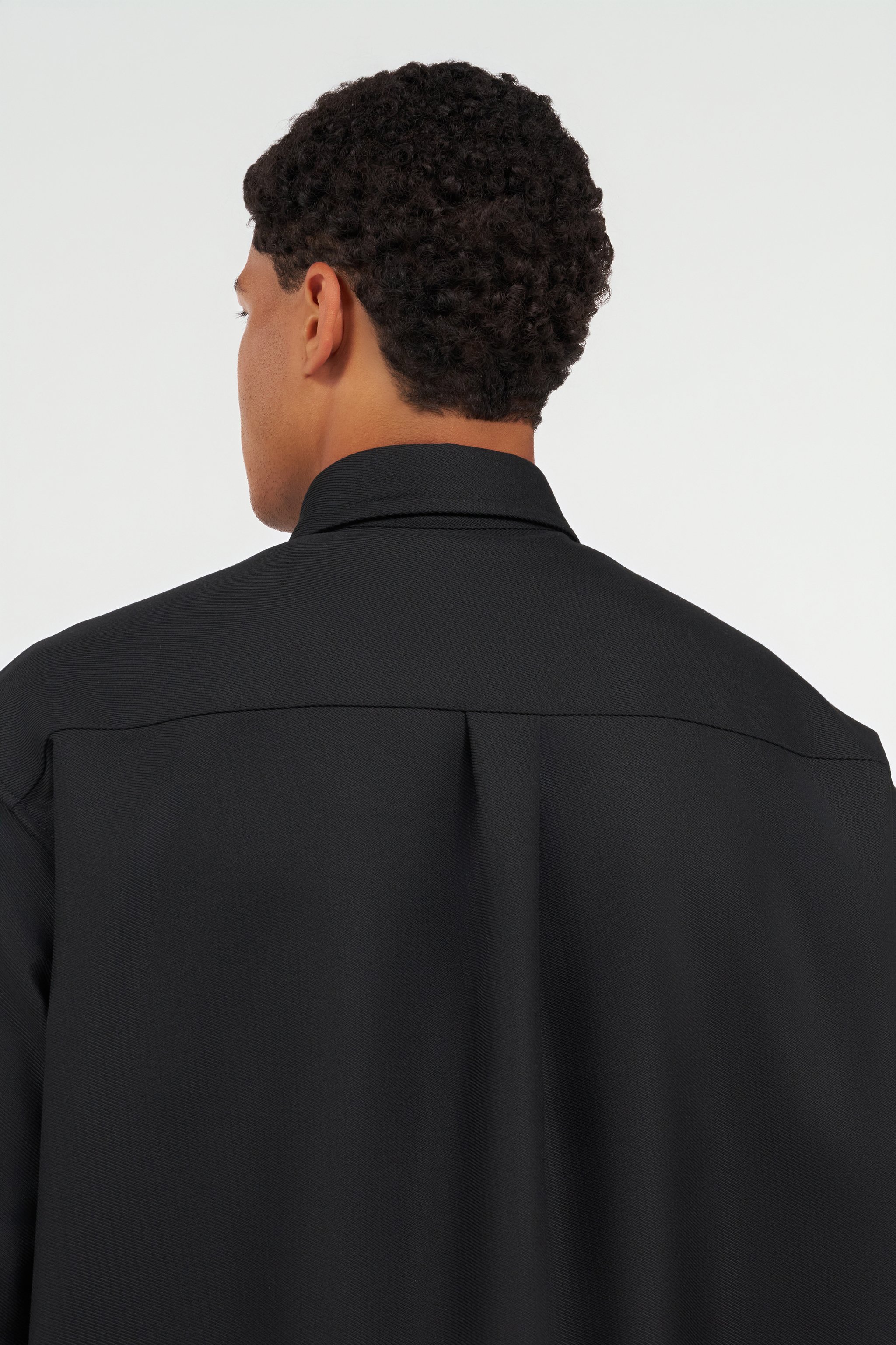 Plain Shirt with Embossed Serpent Motif