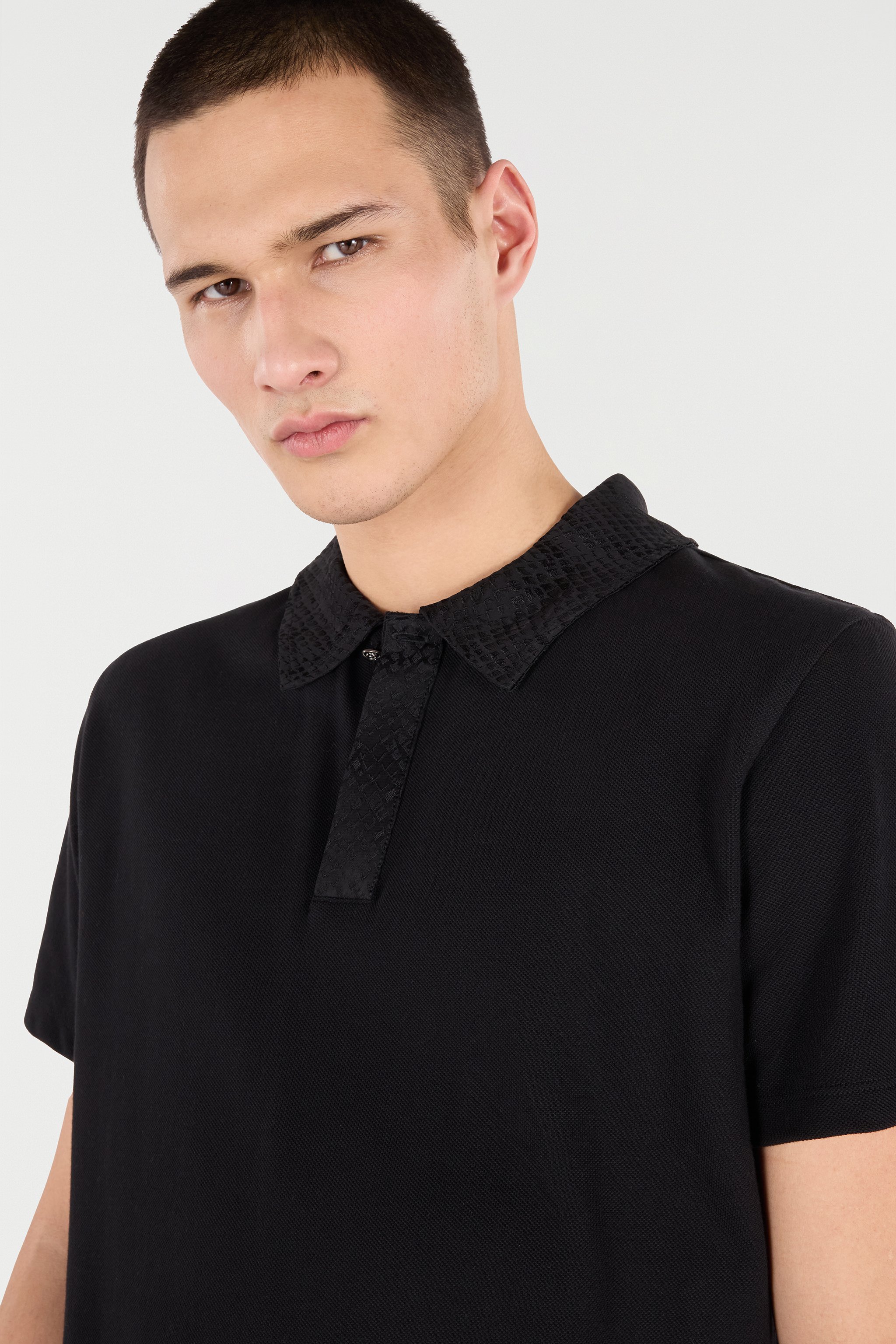 Roberto Cavalli Polo With Snake Scale Embellishment In Black