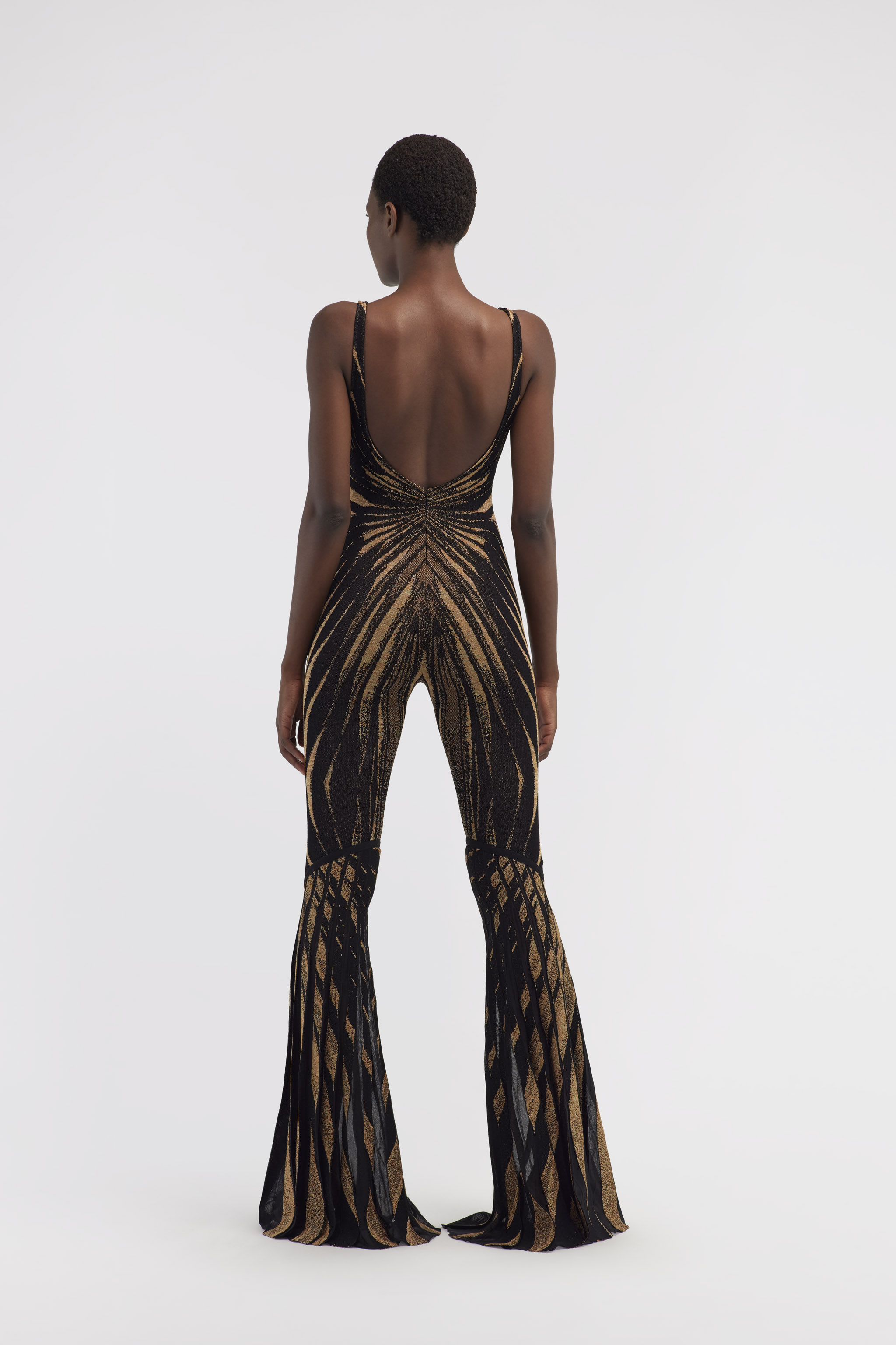 ROBERTO CAVALLI KNIT JUMPSUIT WITH RAY OF GOLD PRINT