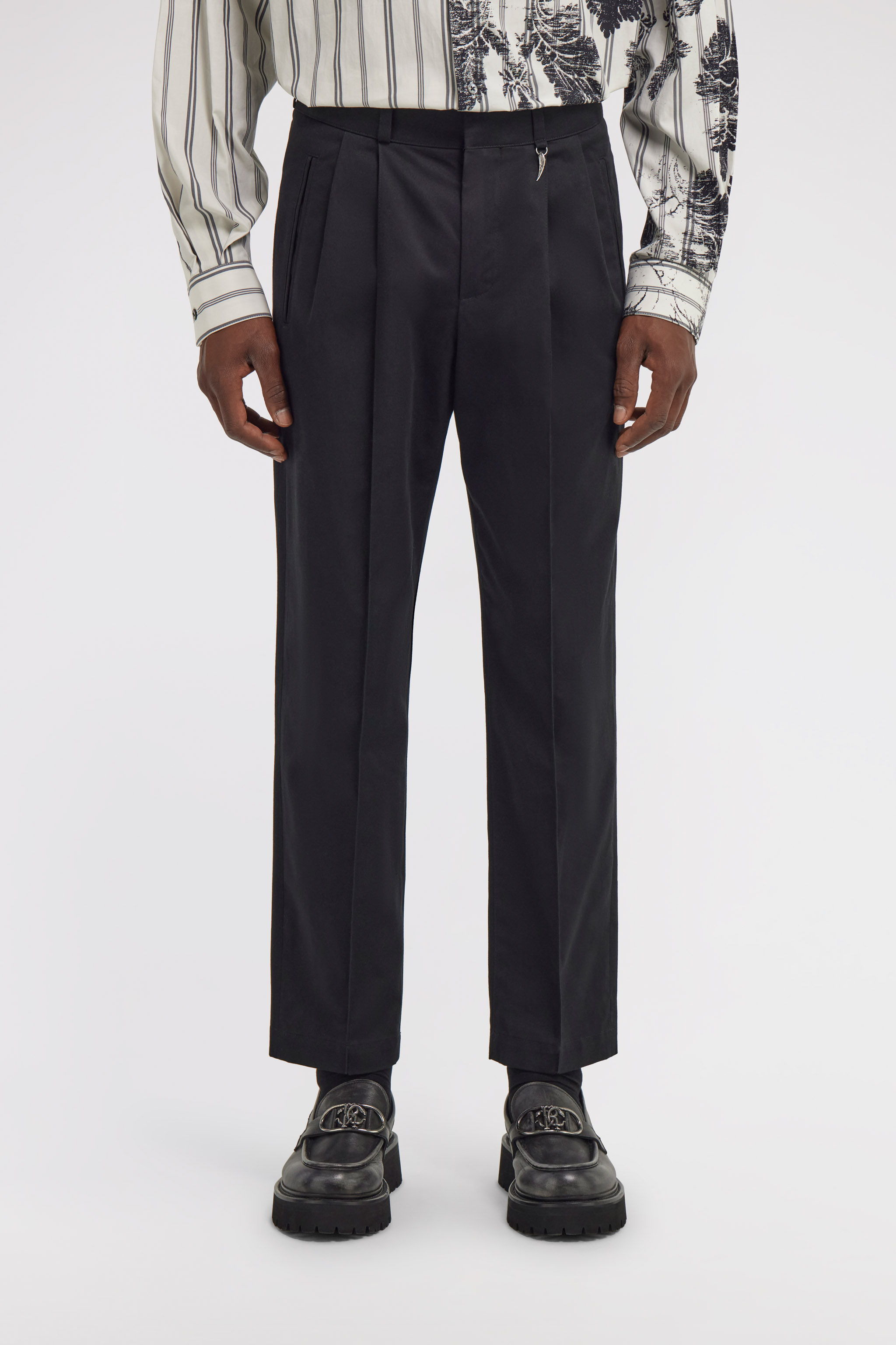 Pants with fang detail