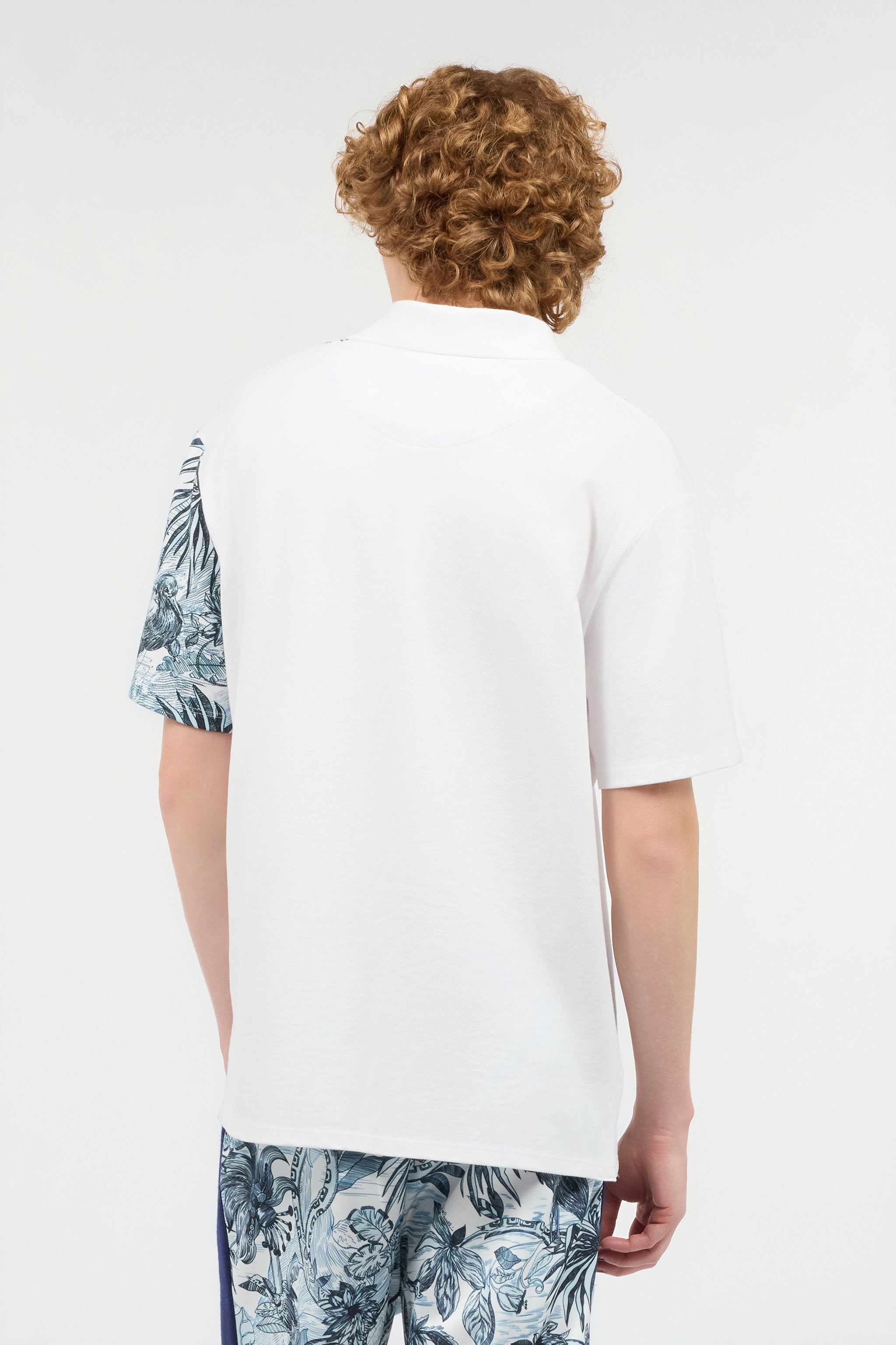 Shop Roberto Cavalli Poloshirt Mit Print Jungle Und Lettering In Light Blue