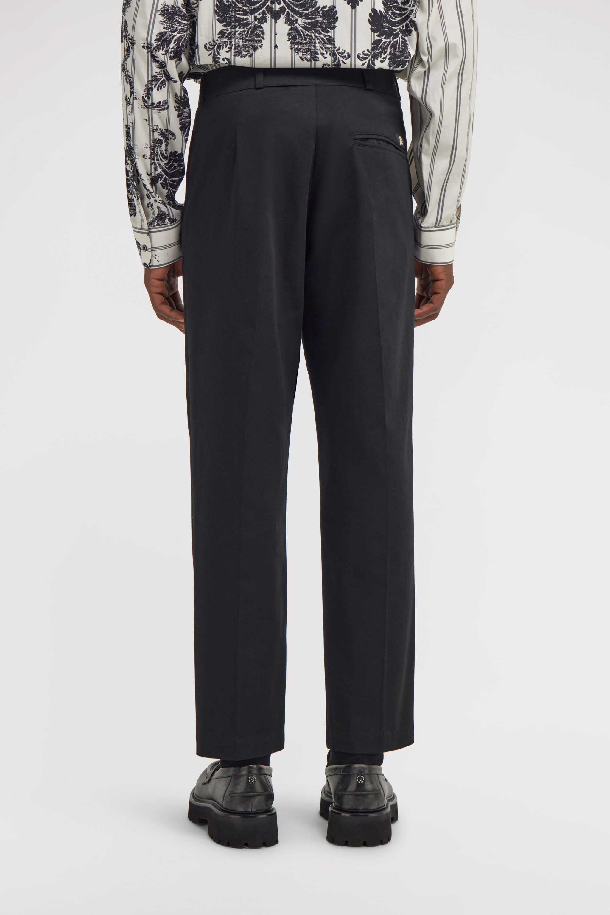 Pants with fang detail