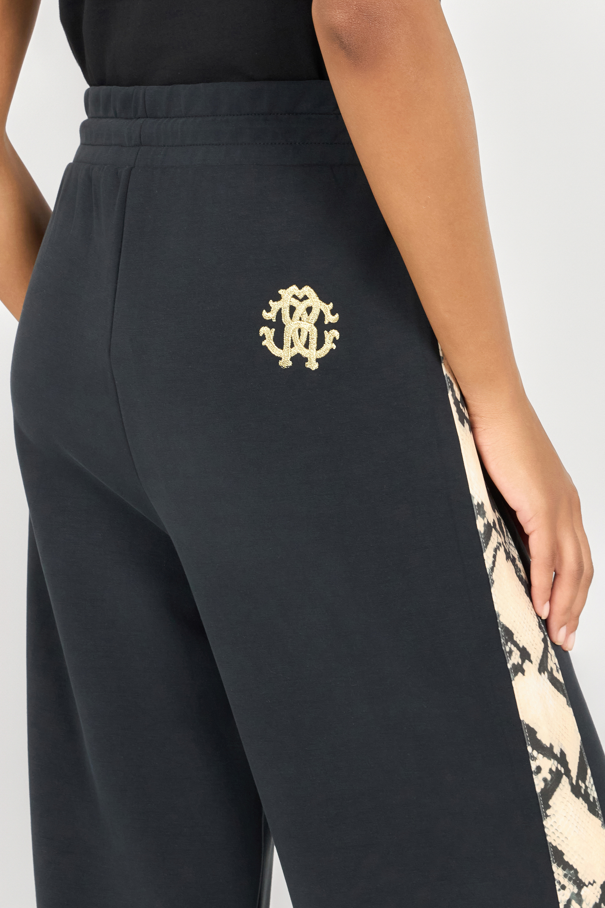 Roberto Cavalli Trousers With Snake Bands In Black