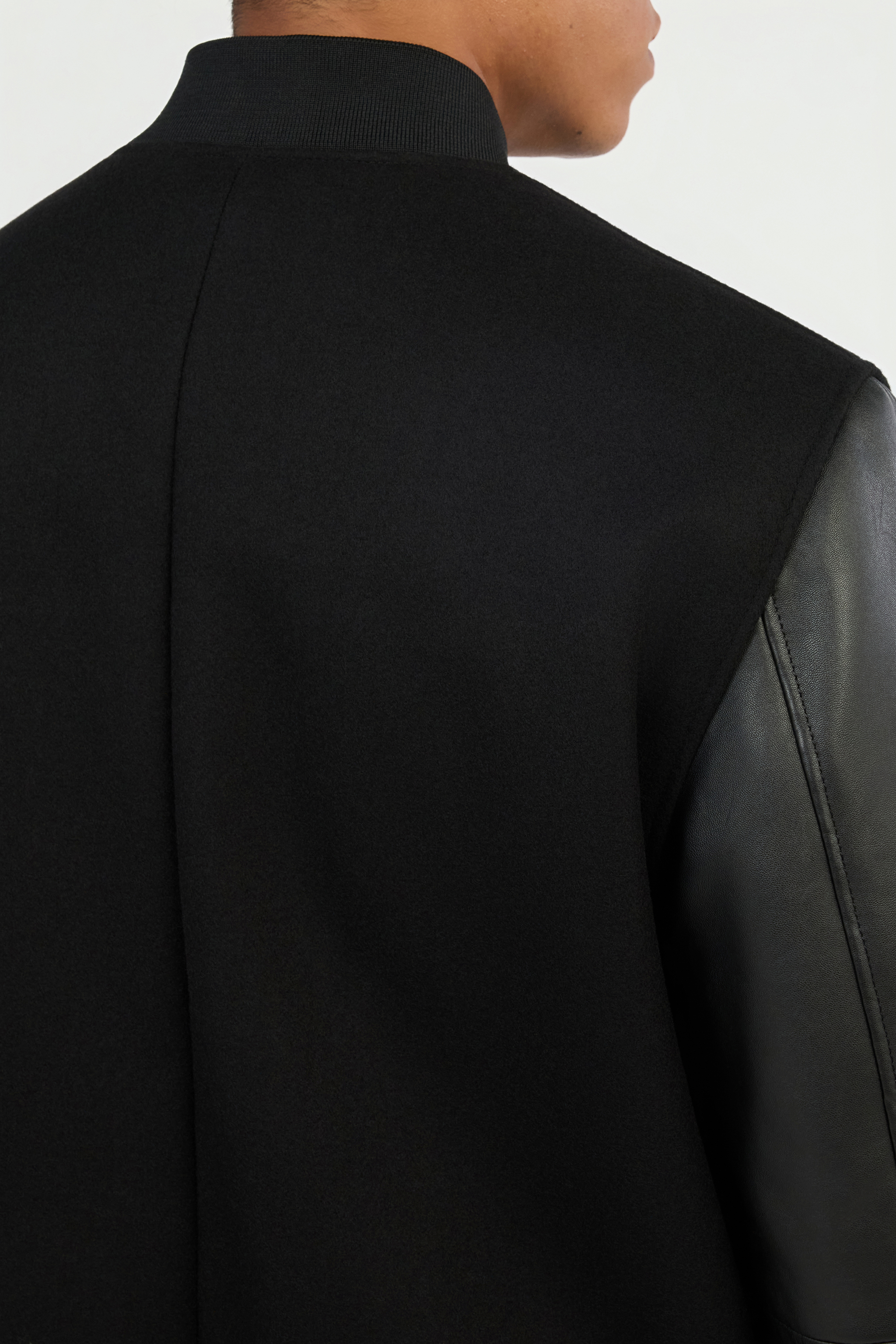 Black Bomber Jacket With Leather Sleeves
