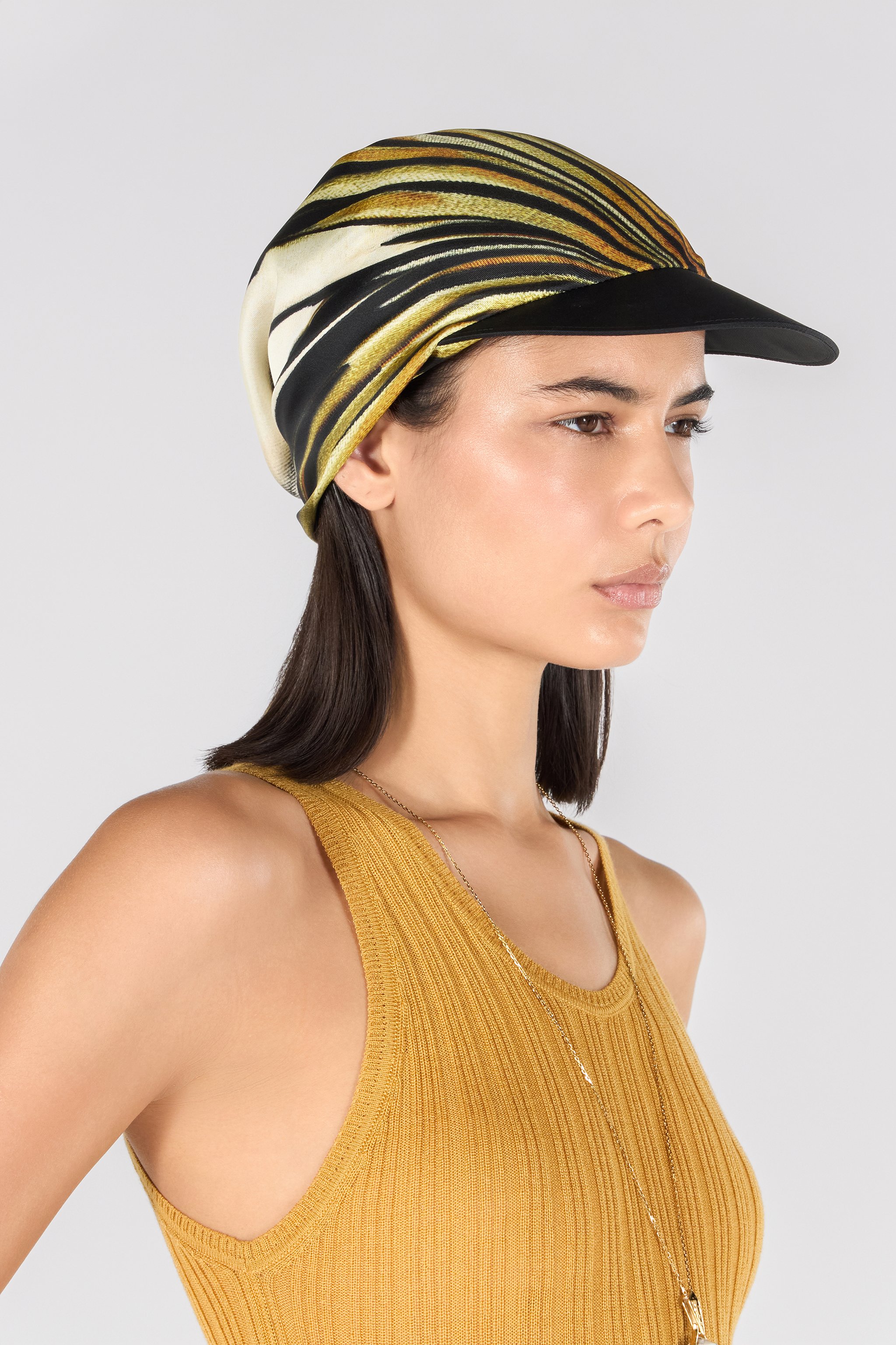 ROBERTO CAVALLI HAT WITH VISOR AND RAY OF GOLD SCARF