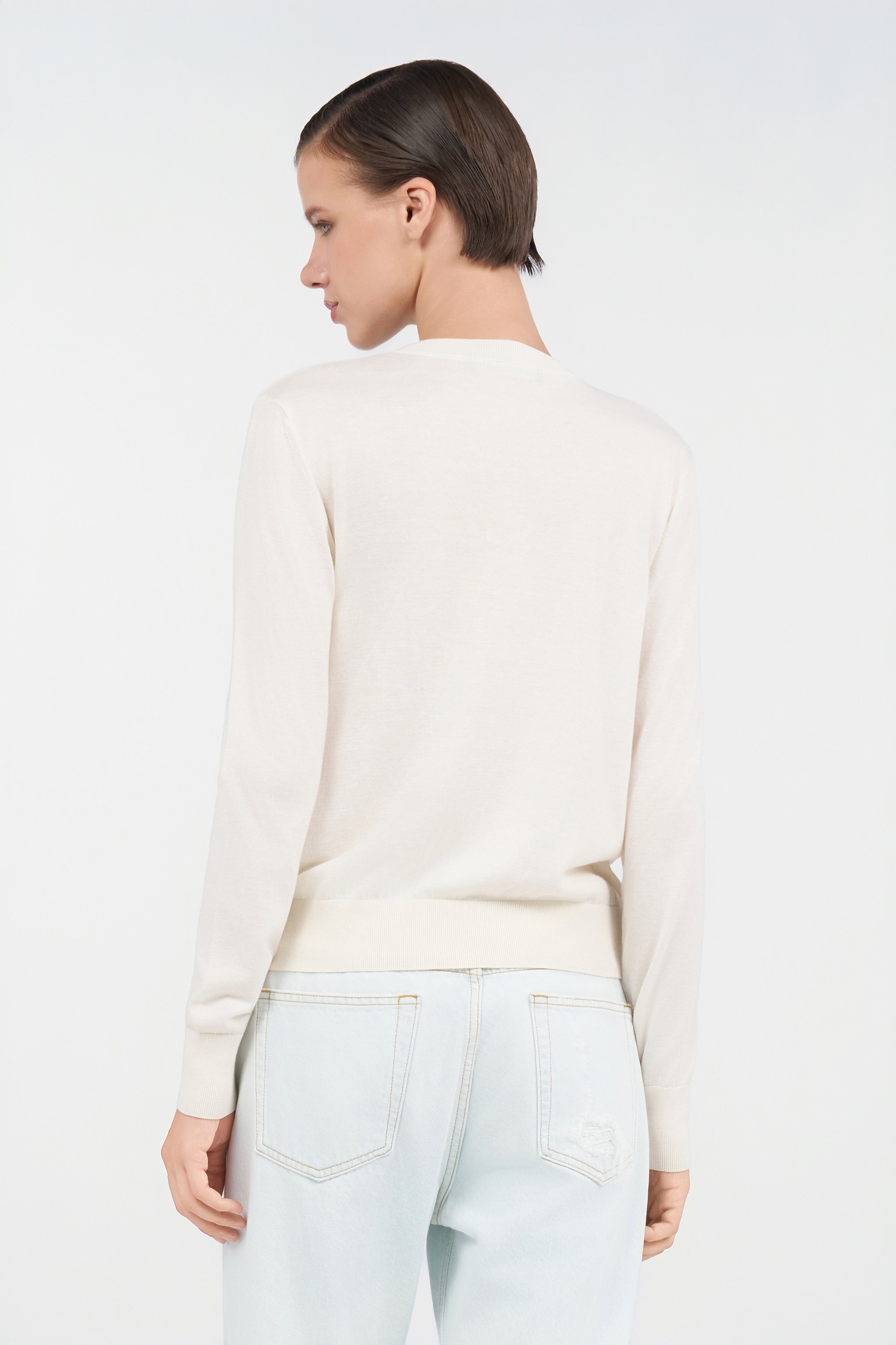 Sweater with gold buttons